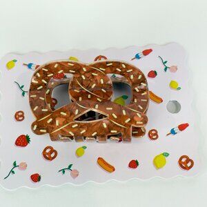Pretzel shaped hair claw clip. New with tags
